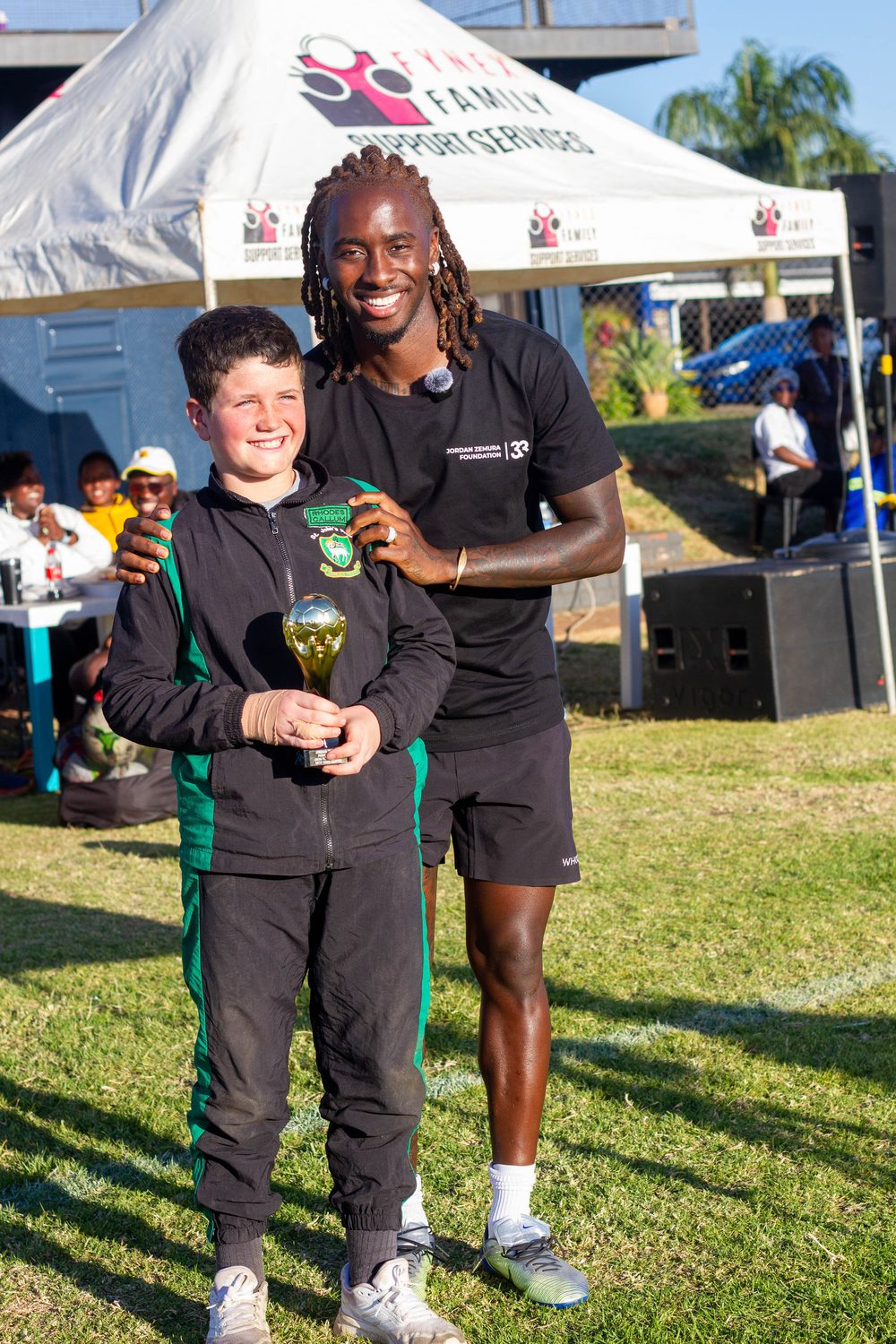 Jordan Zemura with a young trophy winner
