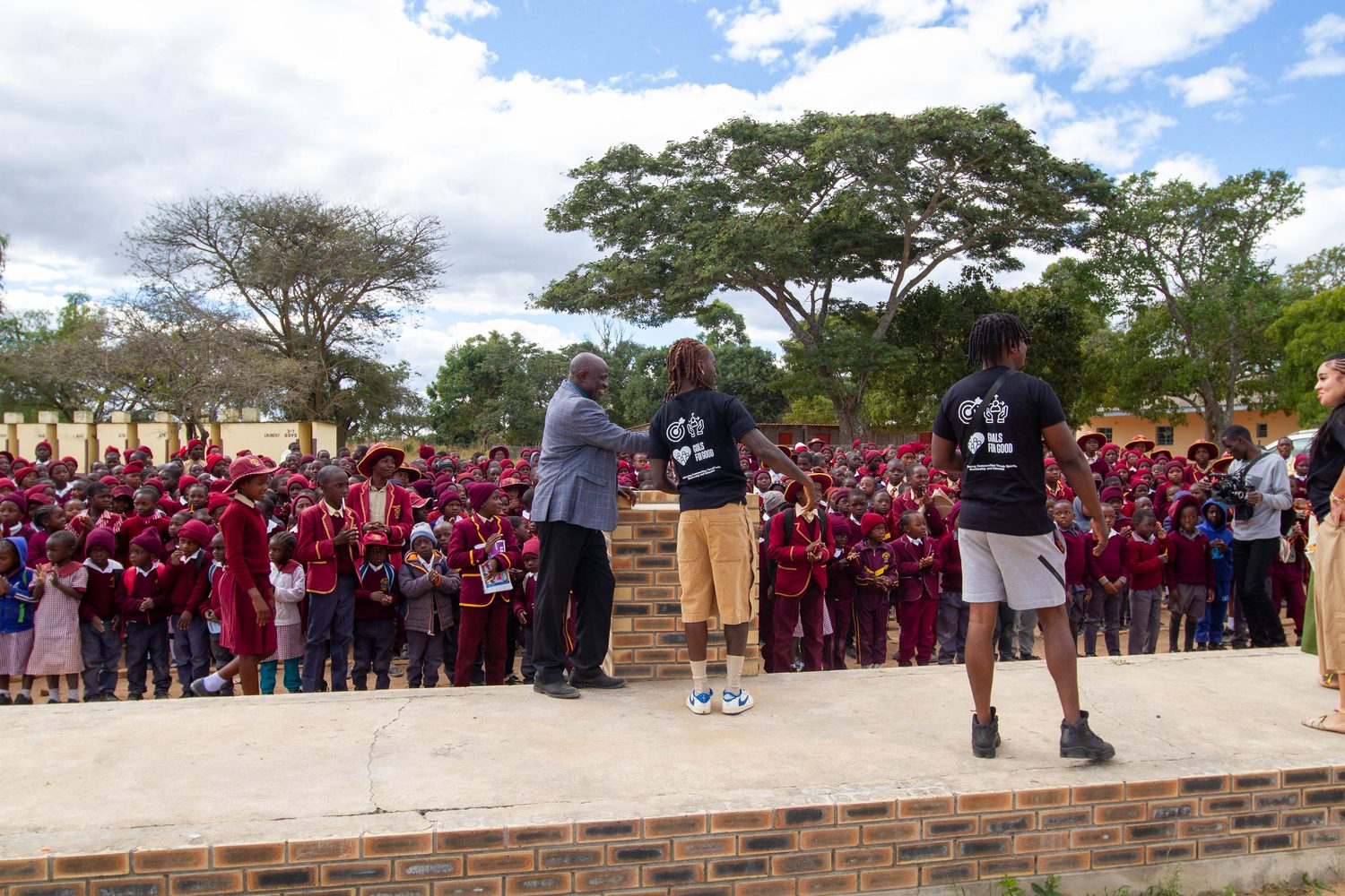 Jordan Zemura addressing a crowd of schoolchildren
